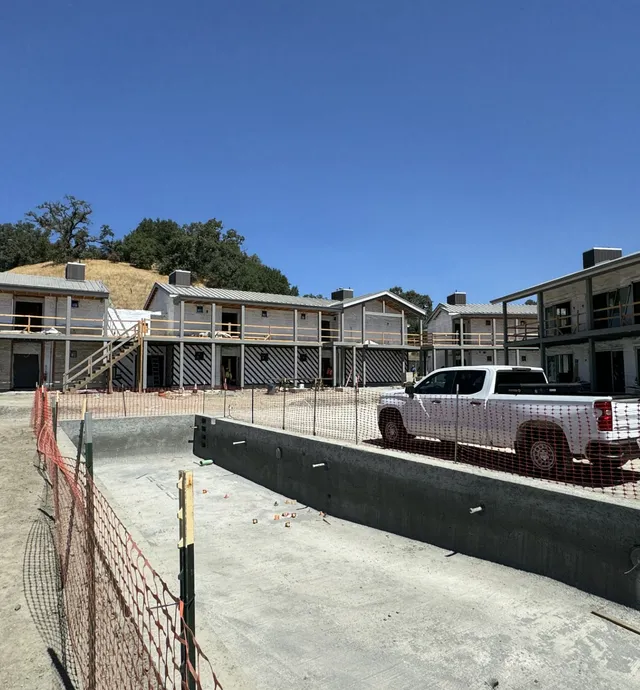 The concrete pour of the pool near the fitness area is complete